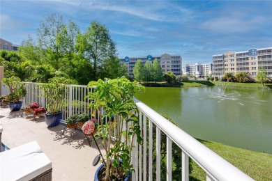 Discover luxury living in this stunning corner condo featuring on East Bay Golf Club in Florida - for sale on GolfHomes.com, golf home, golf lot