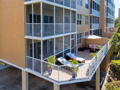 Discover luxury living in this stunning corner condo featuring on East Bay Golf Club in Florida - for sale on GolfHomes.com, golf home, golf lot