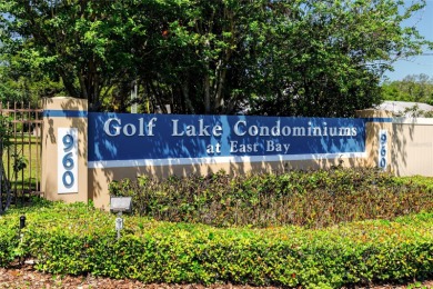 Discover luxury living in this stunning corner condo featuring on East Bay Golf Club in Florida - for sale on GolfHomes.com, golf home, golf lot