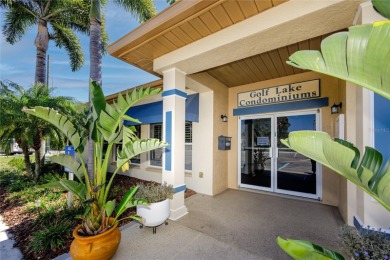 Discover luxury living in this stunning corner condo featuring on East Bay Golf Club in Florida - for sale on GolfHomes.com, golf home, golf lot