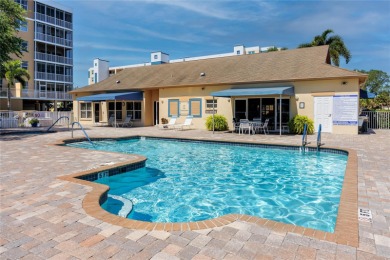 Discover luxury living in this stunning corner condo featuring on East Bay Golf Club in Florida - for sale on GolfHomes.com, golf home, golf lot