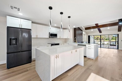 Welcome to 37 Edinburgh, one of a kind fully remodeled, large on PGA National Golf Club in Florida - for sale on GolfHomes.com, golf home, golf lot