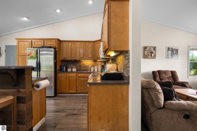 This stunning 4-bedroom, 3-bath custom ranch offers over 3,400 on Emerald Vale Golf Club in Michigan - for sale on GolfHomes.com, golf home, golf lot