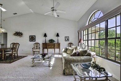 This stunning 3-bedroom, 3-bath pool home in the highly on Timber Pines Golf Course in Florida - for sale on GolfHomes.com, golf home, golf lot