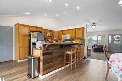 This stunning 4-bedroom, 3-bath custom ranch offers over 3,400 on Emerald Vale Golf Club in Michigan - for sale on GolfHomes.com, golf home, golf lot