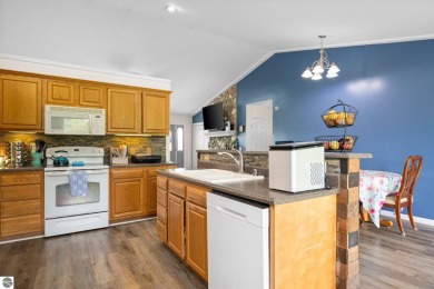 This stunning 4-bedroom, 3-bath custom ranch offers over 3,400 on Emerald Vale Golf Club in Michigan - for sale on GolfHomes.com, golf home, golf lot