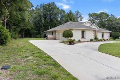 Beautifully decorated Citrus Springs Pool home with 3 bedrooms on Citrus Springs Country Club in Florida - for sale on GolfHomes.com, golf home, golf lot