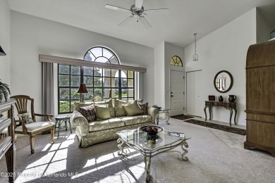 This stunning 3-bedroom, 3-bath pool home in the highly on Timber Pines Golf Course in Florida - for sale on GolfHomes.com, golf home, golf lot