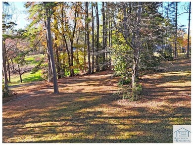 A fantastic opportunity awaits in the highly desirable Chatmoss on Chatmoss Country Club in Virginia - for sale on GolfHomes.com, golf home, golf lot