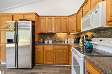This stunning 4-bedroom, 3-bath custom ranch offers over 3,400 on Emerald Vale Golf Club in Michigan - for sale on GolfHomes.com, golf home, golf lot