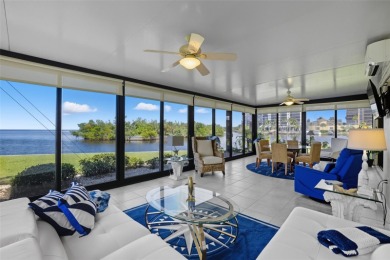 Discover one of the most desirable residences in Marina South on Burnt Store Golf Club in Florida - for sale on GolfHomes.com, golf home, golf lot