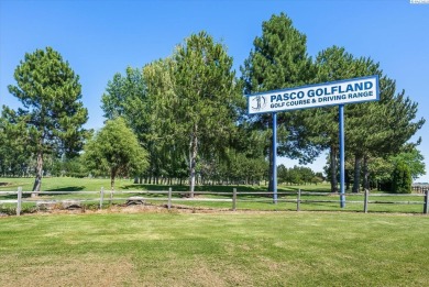 How would you like to walk across the street to Pasco Golfland? on Pasco Golfland in Washington - for sale on GolfHomes.com, golf home, golf lot