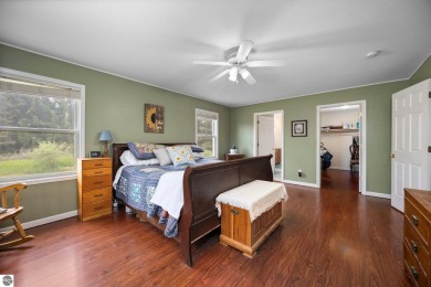 This stunning 4-bedroom, 3-bath custom ranch offers over 3,400 on Emerald Vale Golf Club in Michigan - for sale on GolfHomes.com, golf home, golf lot