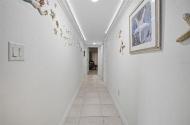 Discover one of the most desirable residences in Marina South on Burnt Store Golf Club in Florida - for sale on GolfHomes.com, golf home, golf lot