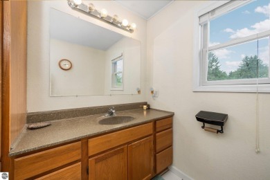 This stunning 4-bedroom, 3-bath custom ranch offers over 3,400 on Emerald Vale Golf Club in Michigan - for sale on GolfHomes.com, golf home, golf lot
