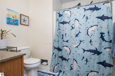 This stunning 4-bedroom, 3-bath custom ranch offers over 3,400 on Emerald Vale Golf Club in Michigan - for sale on GolfHomes.com, golf home, golf lot