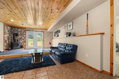 This stunning 4-bedroom, 3-bath custom ranch offers over 3,400 on Emerald Vale Golf Club in Michigan - for sale on GolfHomes.com, golf home, golf lot
