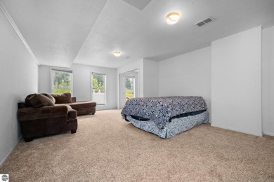This stunning 4-bedroom, 3-bath custom ranch offers over 3,400 on Emerald Vale Golf Club in Michigan - for sale on GolfHomes.com, golf home, golf lot