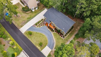 Welcome to this meticulously crafted 4-bedroom, 3-bathroom home on Country Club of North Carolina in North Carolina - for sale on GolfHomes.com, golf home, golf lot