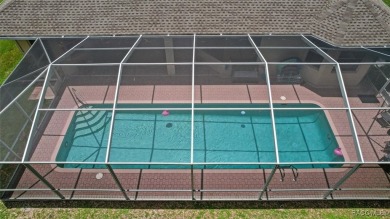 Beautifully decorated Citrus Springs Pool home with 3 bedrooms on Citrus Springs Country Club in Florida - for sale on GolfHomes.com, golf home, golf lot