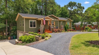 Welcome to this meticulously crafted 4-bedroom, 3-bathroom home on Country Club of North Carolina in North Carolina - for sale on GolfHomes.com, golf home, golf lot