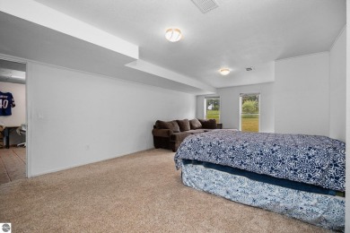 This stunning 4-bedroom, 3-bath custom ranch offers over 3,400 on Emerald Vale Golf Club in Michigan - for sale on GolfHomes.com, golf home, golf lot