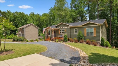 Welcome to this meticulously crafted 4-bedroom, 3-bathroom home on Country Club of North Carolina in North Carolina - for sale on GolfHomes.com, golf home, golf lot