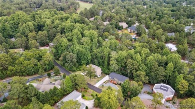 Welcome to this meticulously crafted 4-bedroom, 3-bathroom home on Country Club of North Carolina in North Carolina - for sale on GolfHomes.com, golf home, golf lot