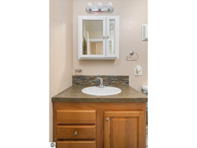 This stunning 4-bedroom, 3-bath custom ranch offers over 3,400 on Emerald Vale Golf Club in Michigan - for sale on GolfHomes.com, golf home, golf lot