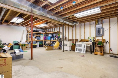 This stunning 4-bedroom, 3-bath custom ranch offers over 3,400 on Emerald Vale Golf Club in Michigan - for sale on GolfHomes.com, golf home, golf lot
