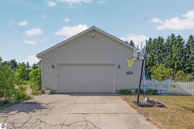 This stunning 4-bedroom, 3-bath custom ranch offers over 3,400 on Emerald Vale Golf Club in Michigan - for sale on GolfHomes.com, golf home, golf lot