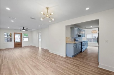 This beautifully renovated home feels just like new construction on Sea Palms Golf and Tennis Resort in Georgia - for sale on GolfHomes.com, golf home, golf lot