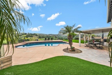 Welcome to this stunning residence overlooking the lush greens on Anaheim Hills Golf Course in California - for sale on GolfHomes.com, golf home, golf lot