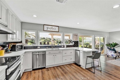 Welcome to this stunning residence overlooking the lush greens on Anaheim Hills Golf Course in California - for sale on GolfHomes.com, golf home, golf lot