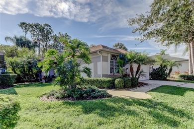 This beautiful, meticulously maintained home is situated on an on Westchase Golf Club in Florida - for sale on GolfHomes.com, golf home, golf lot