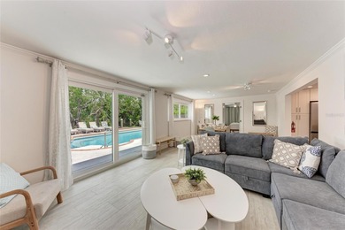 Discover Mia Bella -- a rare canal-front estate on Anna Maria on Key Royale Club in Florida - for sale on GolfHomes.com, golf home, golf lot