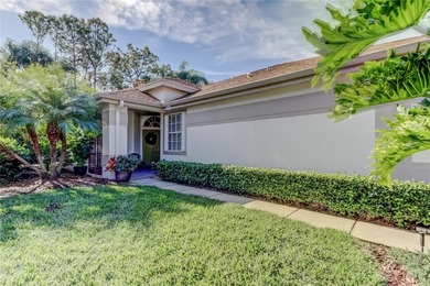 This beautiful, meticulously maintained home is situated on an on Westchase Golf Club in Florida - for sale on GolfHomes.com, golf home, golf lot
