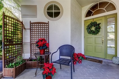 This beautiful, meticulously maintained home is situated on an on Westchase Golf Club in Florida - for sale on GolfHomes.com, golf home, golf lot