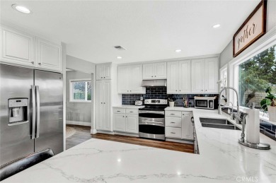 Welcome to this stunning residence overlooking the lush greens on Anaheim Hills Golf Course in California - for sale on GolfHomes.com, golf home, golf lot