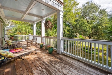 The pond view is breathtaking! This Low Country 5 bedroom, 5 on DeBordieu Country Club in South Carolina - for sale on GolfHomes.com, golf home, golf lot