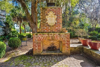 The pond view is breathtaking! This Low Country 5 bedroom, 5 on DeBordieu Country Club in South Carolina - for sale on GolfHomes.com, golf home, golf lot