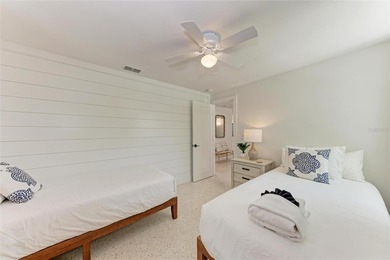 Discover Mia Bella -- a rare canal-front estate on Anna Maria on Key Royale Club in Florida - for sale on GolfHomes.com, golf home, golf lot