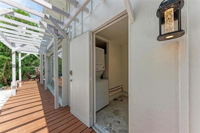 Discover Mia Bella -- a rare canal-front estate on Anna Maria on Key Royale Club in Florida - for sale on GolfHomes.com, golf home, golf lot