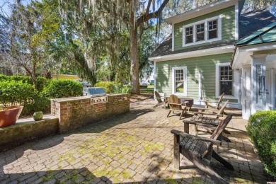 The pond view is breathtaking! This Low Country 5 bedroom, 5 on DeBordieu Country Club in South Carolina - for sale on GolfHomes.com, golf home, golf lot