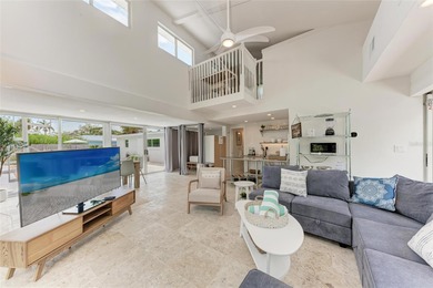 Discover Mia Bella -- a rare canal-front estate on Anna Maria on Key Royale Club in Florida - for sale on GolfHomes.com, golf home, golf lot