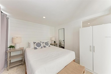 Discover Mia Bella -- a rare canal-front estate on Anna Maria on Key Royale Club in Florida - for sale on GolfHomes.com, golf home, golf lot