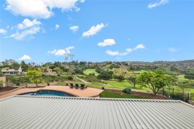 Welcome to this stunning residence overlooking the lush greens on Anaheim Hills Golf Course in California - for sale on GolfHomes.com, golf home, golf lot