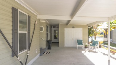 LAND LEASE PROPERTY. Fabulous water views from the screened on Savanna Golf Club in Florida - for sale on GolfHomes.com, golf home, golf lot