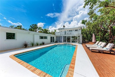 Discover Mia Bella -- a rare canal-front estate on Anna Maria on Key Royale Club in Florida - for sale on GolfHomes.com, golf home, golf lot
