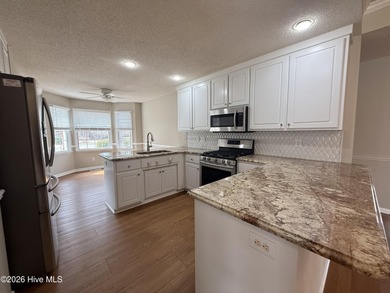 This beautifully maintained all brick home sits on one of the on Taberna Country Club in North Carolina - for sale on GolfHomes.com, golf home, golf lot